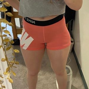 Pink/Peachy Nike pros (size: small)